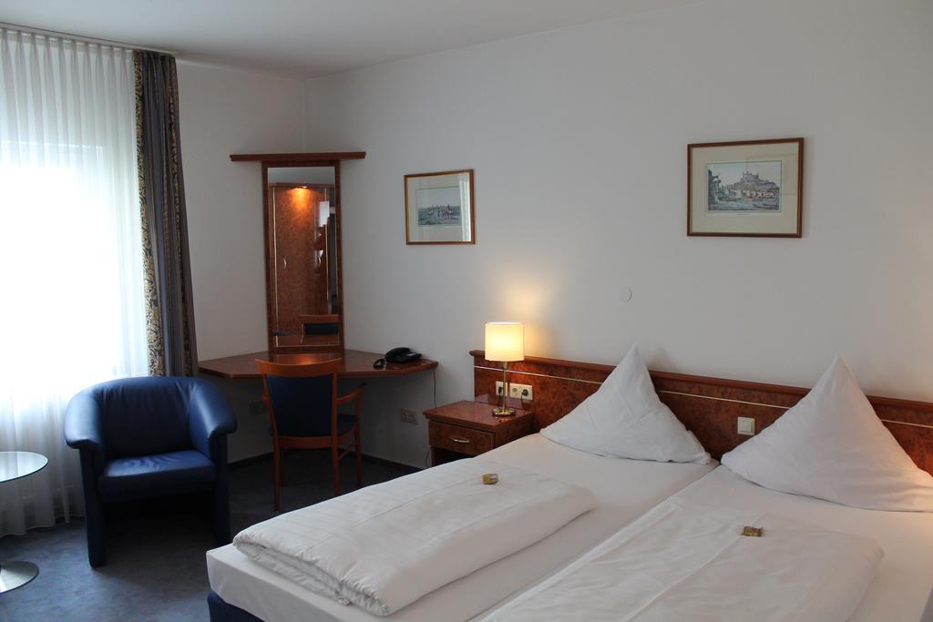 City Hotel Kassel Quarto foto